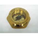 A boxed brass compass by Henry Hughes