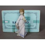 Lladro - A boxed figurine entitled School Days, # 7604,
