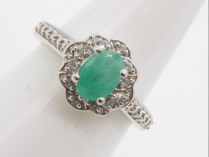 A Carnaiba Brazilian Emerald & White Topaz Sterling Silver ring size N to O issued in a limited