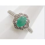 A Carnaiba Brazilian Emerald & White Topaz Sterling Silver ring size N to O issued in a limited