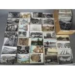 In excess of 400 Early - Mid Period Foreign postcards to include real photos and street scenes.