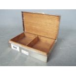 A silver hallmarked cigarette box, Birmingham assay 1986,