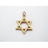 A 9ct yellow gold Star of David pendant, 2.5 cm x 25. cm, approximately 4.9 grams all in.