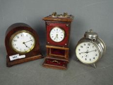 A Bayard, mahogany cased, 8 day mantel clock, approximately 15.5 cm (h) and two other clocks.