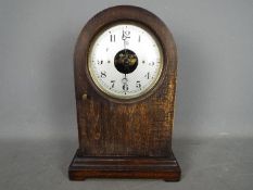 An early 20th century Bulle ‘tall model’ mantel clock,