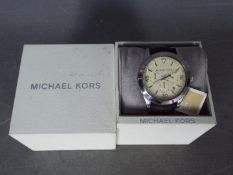 A gentleman's Michael Kors wristwatch,