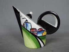 Lorna Bailey - A Concorde teapot in the Deco House pattern, signed,