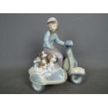 Lladro - A Lladro figural group depicting a boy on a scooter with a sidecar containing three