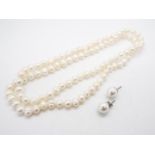 A Kaori Cultured Pearl Sterling Silver set of Necklace and Earrings,