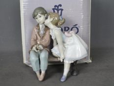 Lladro - A boxed figural group entitled Ten And Growing, # 7635,