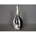 Lorna Bailey - A Middleport pattern bottle vase, signed to the base,