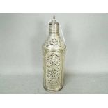 An Iranian silver bottle cover with pierced and chased decoration, approximately 706 grams, 22.