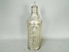 An Iranian silver bottle cover with pierced and chased decoration, approximately 706 grams, 22.