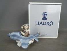 Lladro - A boxed figurine entitled Over The Clouds, # 5697,