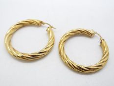 A pair of 9ct gold hoop earrings, 4 cm (d), approximately 4 grams all in.