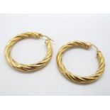 A pair of 9ct gold hoop earrings, 4 cm (d), approximately 4 grams all in.