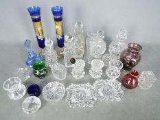 A collection of glassware to include scent bottles, Venetian glass,