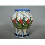 Moorcroft - a Moorcroft Eleven Pipers Pi