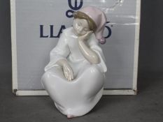 Lladro - A boxed figurine entitled Just