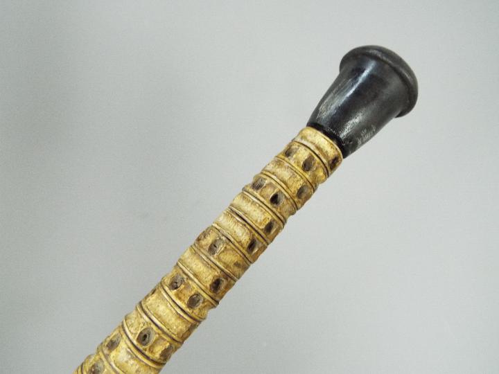 A shark vertebrae walking stick, length - Image 4 of 4