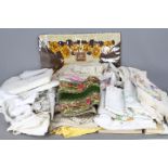 A collection of vintage linen, tableware etc.