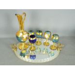 A Venetian glass drink serving set.