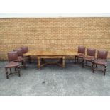 An extending dining table and six dining chairs,