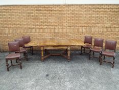 An extending dining table and six dining chairs,