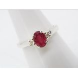 A size P to Q Malagasy Ruby & White Zircon set in a silver ring,