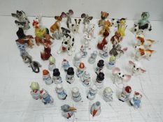 Notable Nodding Head China Pottery collection. Tallest is 12cm high.