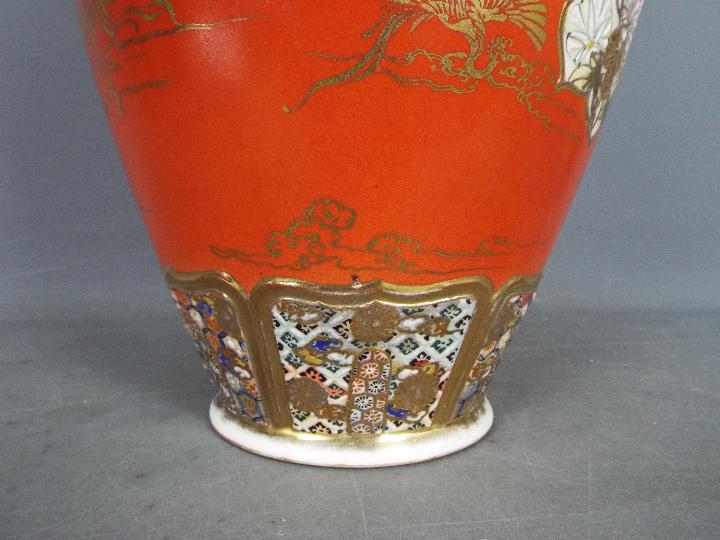 A large Japanese vase decorated with panels of samurai, scholars, flowers against a red ground, - Image 6 of 9