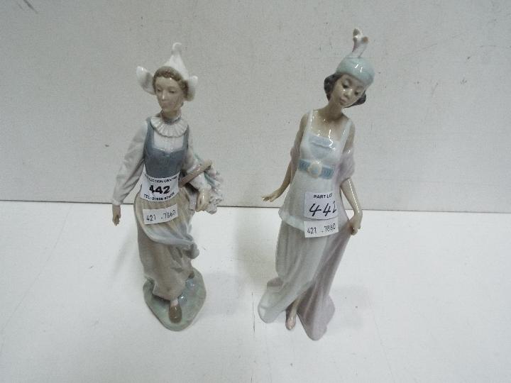 Lladro Two lady figures. Blue factory mark. Impressed marks 5788 M -12 N. 27cm high. (2).