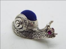 Silver - a silver pin cushion in the style os a snail