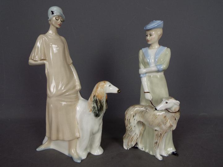 Royal Doulton - Two large figurines from the Reflections series comprising Park Parade HN3116 and
