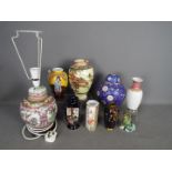 A collection of ceramics to include vases, ginger jar converted to a table lamp and similar.