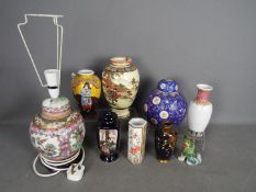A collection of ceramics to include vases, ginger jar converted to a table lamp and similar.