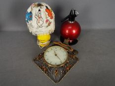 Lot to include a vintage Mr Happy bedside lamp, Paico wall clock and a Globemaster soda syphon.