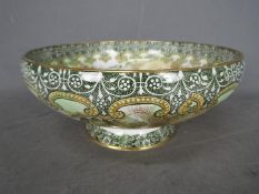 Royal Doulton - An early 20th century pedestal bowl with floral decoration,