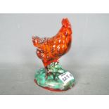 Anita Harris - an Anita Harris ceramic hen, signed,