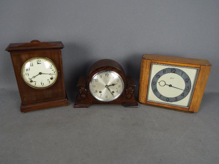 Lot to include a Telavox, wood cased clock,