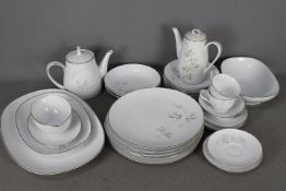 A collection of Noritake dinner and tea wares in the Rowena pattern.
