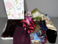 A collection of lady's head scarves, silk and other and a fur stole.