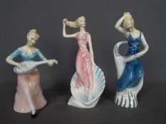 Royal Doulton - Three figurines comprising HN2202 Melody, HN2192 Wood Nymph and HN2191 Sea Sprite,