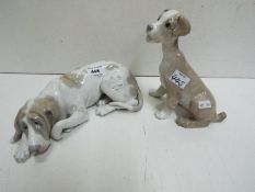 Lladro Two Dog figures. Blue factory marks and impressed numbers. Tallest 20cm high.