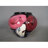 Moorcroft - a ceramic Bella Houston vase by Moorcroft,