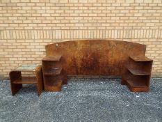 A burr walnut veneered double headboard with integral, flanking shelving sections,