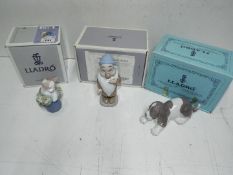 Lladro / Disney - Three figures(boxed). Blue factory marks and impressed numbers.