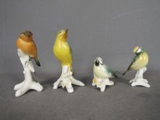 Karl Ens - Four ceramic bird figurines, largest approximately 13 cm (h).