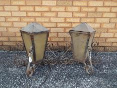 A pair of vintage lanterns.