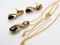 A 9ct gold, diamond and sapphire jewellery set comprising pendant on fine link chain, stamped 375,
